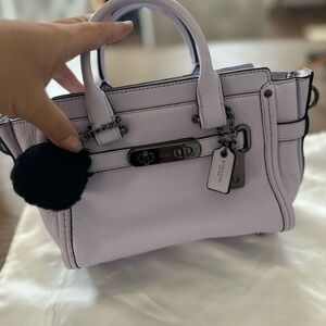 authentic coach mini bag .brand new